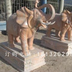 象鼻向上大象石雕，晚霞紅大象雕塑